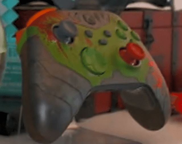 Polička Philla Spencera teasuje Xbox gamepad s Doom témou