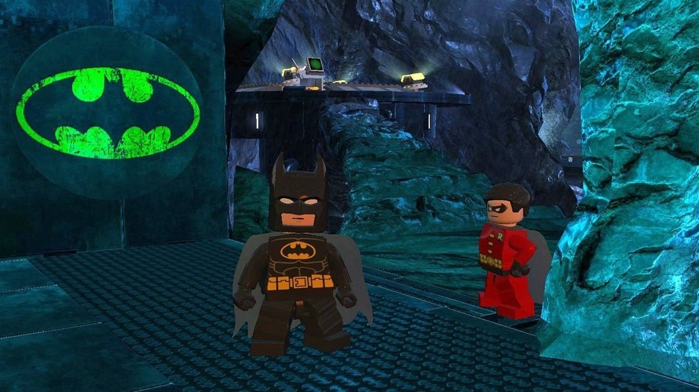 LEGO Batman 2: DC Super Heroes Batman a Robin zanaj kad misiu v jaskyni.