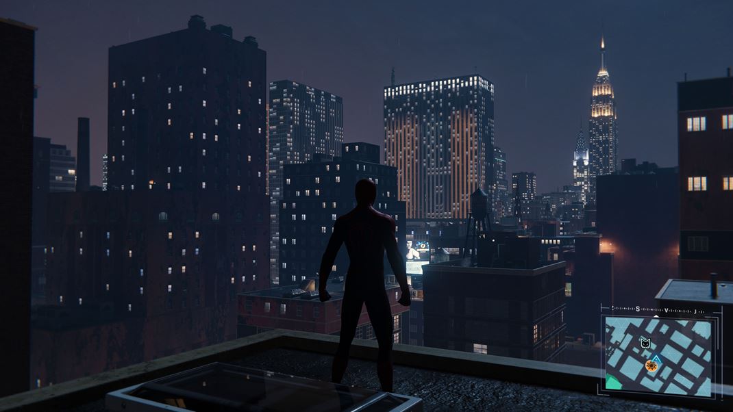 Marvel's Spider-man Remastered (PC) V noci je mesto viac fdne, svetl s ploch.